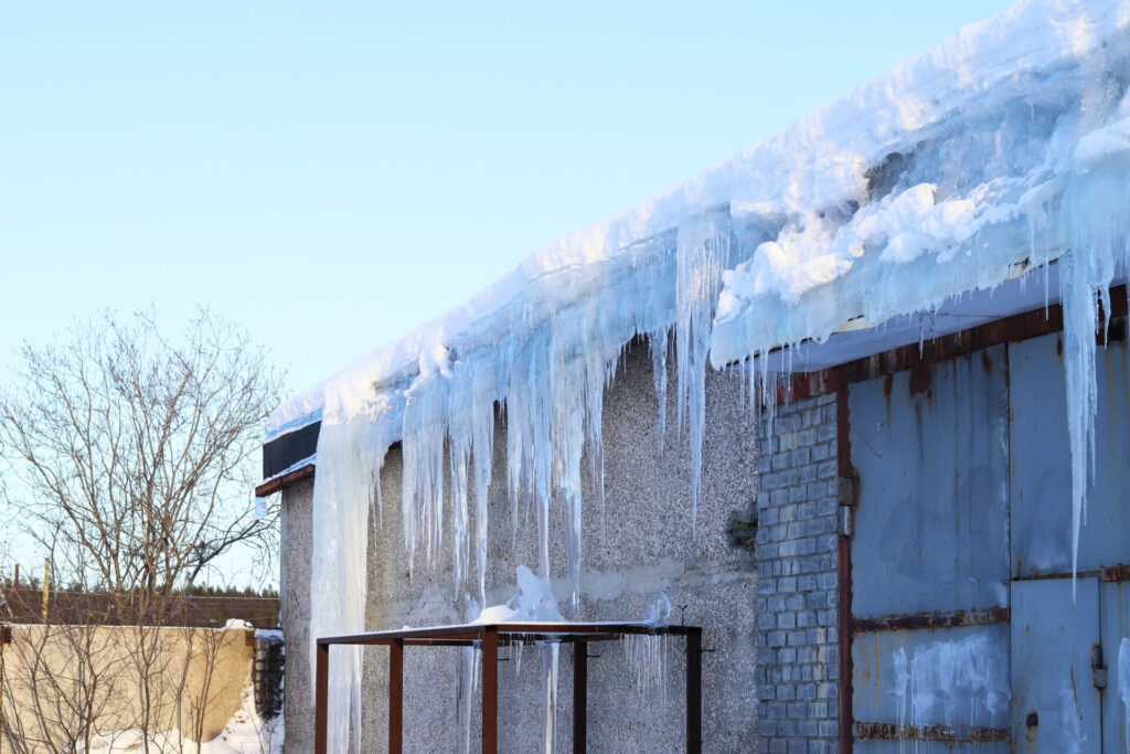 Ice dams are a major red flag that a home needs new attic insulation for warmth.